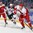 BUFFALO, NEW YORK - DECEMBER 26: Denmark's Rasmus Heine #9 maintains puck possession against USA's Josh Norris #9 during the preliminary round of the 2018 IIHF World Junior Championship. (Photo by Andrea Cardin/HHOF-IIHF Images)

